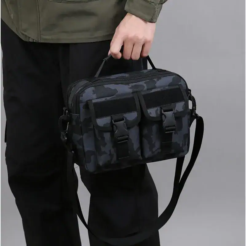 BG16 Tactical outdoor shoulder bag in black camouflage with multiple front pockets and USB charging port.