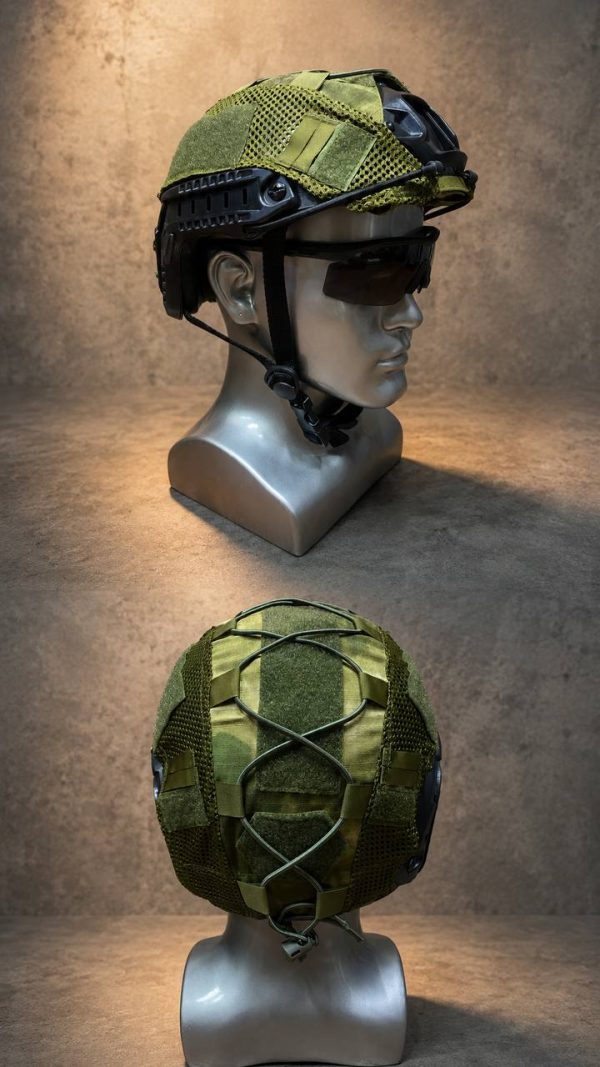 Tactical mesh helmet cover in green for outdoor and training helmets, fits securely with adjustable straps.