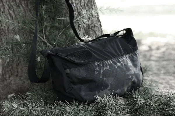 កាបូបស្ពាយឆ្លងកាយ Tactical Sling Dumpling Bag សម្រាប់ក្រៅផ្ទះ មានស្រទាប់ជួយជ្រាបទឹកតិច.