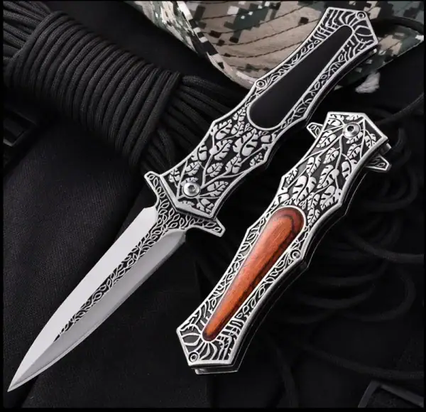 K28 Premium Engraved EDC Folding Knife with wood handle and intricate engraving, tactical outdoor gear.