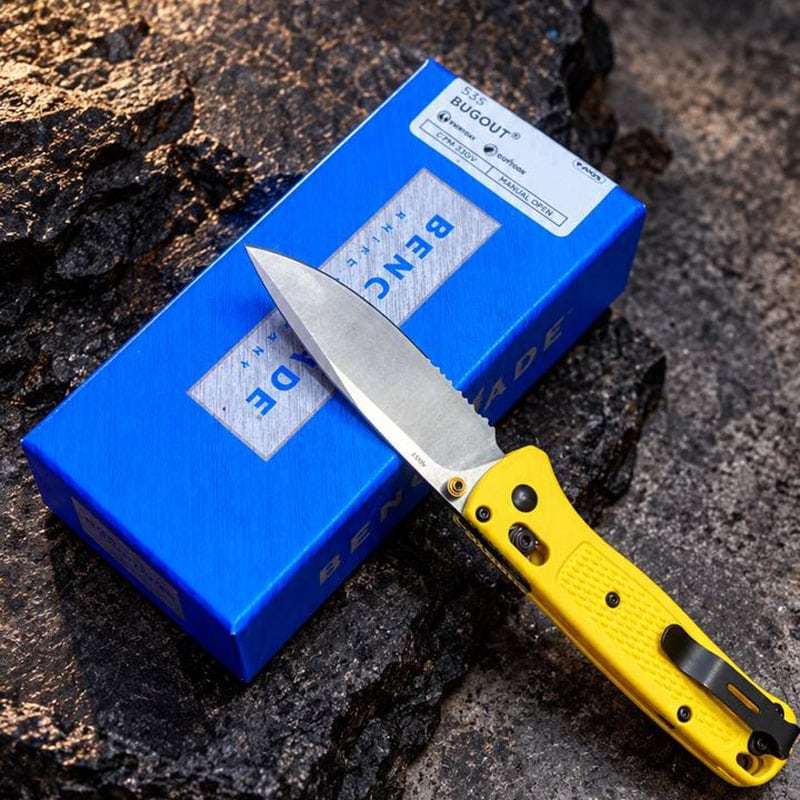 K55 Compact Folding Utility Knife with Textured Yellow Handle for outdoor use.