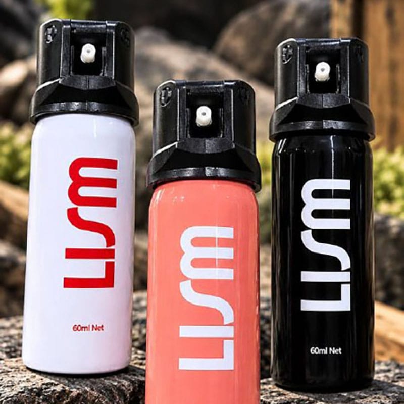 PS01 60ml Compact Personal Safety Spray in white, pink, and black colors.