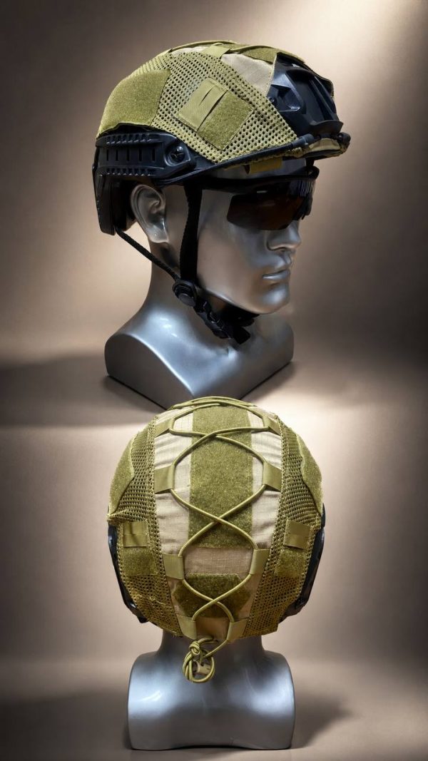 Tactical mesh helmet cover in green for outdoor and training helmets, fits securely with adjustable straps.