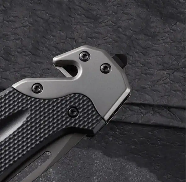 K04 Titanium-Plated 3cr13 stainless steel tactical folding knife with black handle and silver blade.