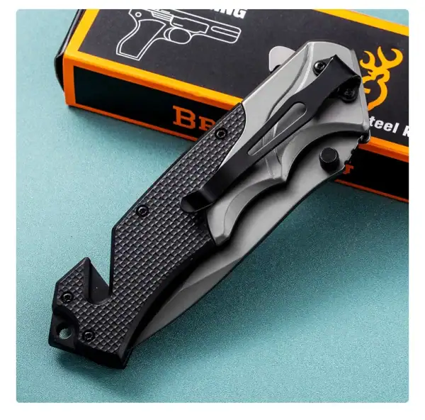 K05 Browning X-Fold tactical survival knife with stainless steel blade and black handle, outdoor gear for Phnom Penh.