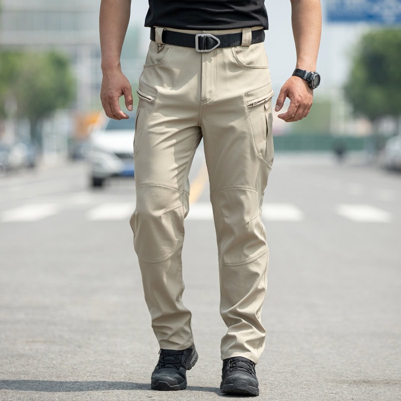 Men's lightweight tactical cargo pants in beige with multiple pockets for outdoor and training use.
