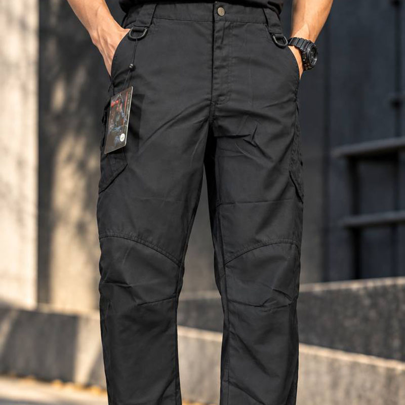 Black tactical cargo pants with utility pockets and D-ring details for outdoor and tactical use.