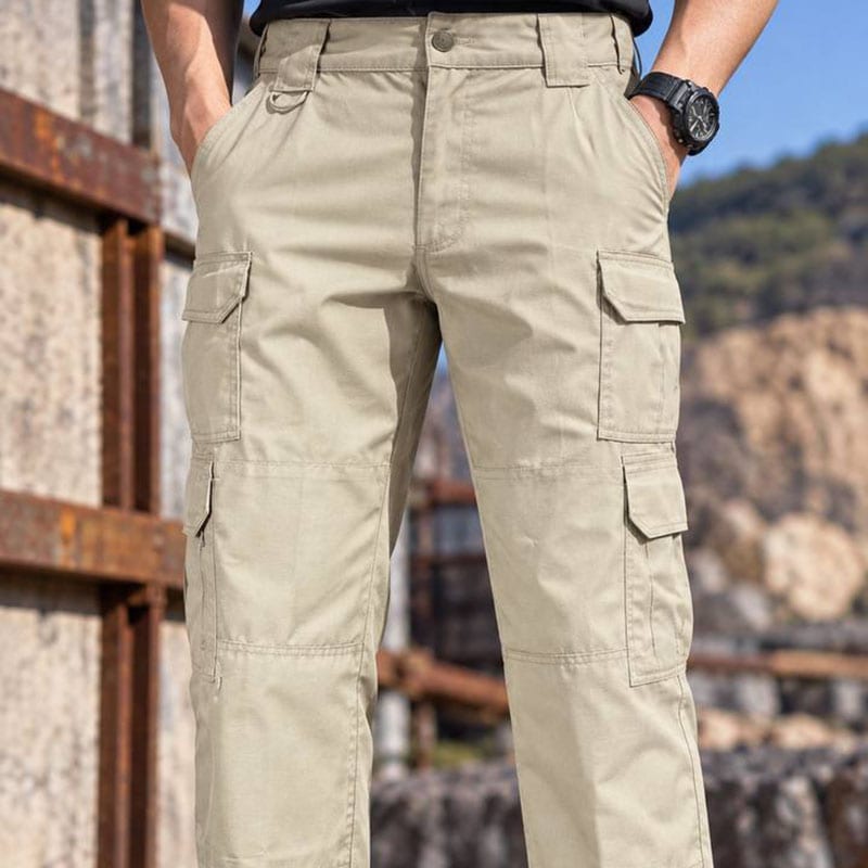 Khaki tactical cargo pants with multiple pockets for outdoor and tactical use.