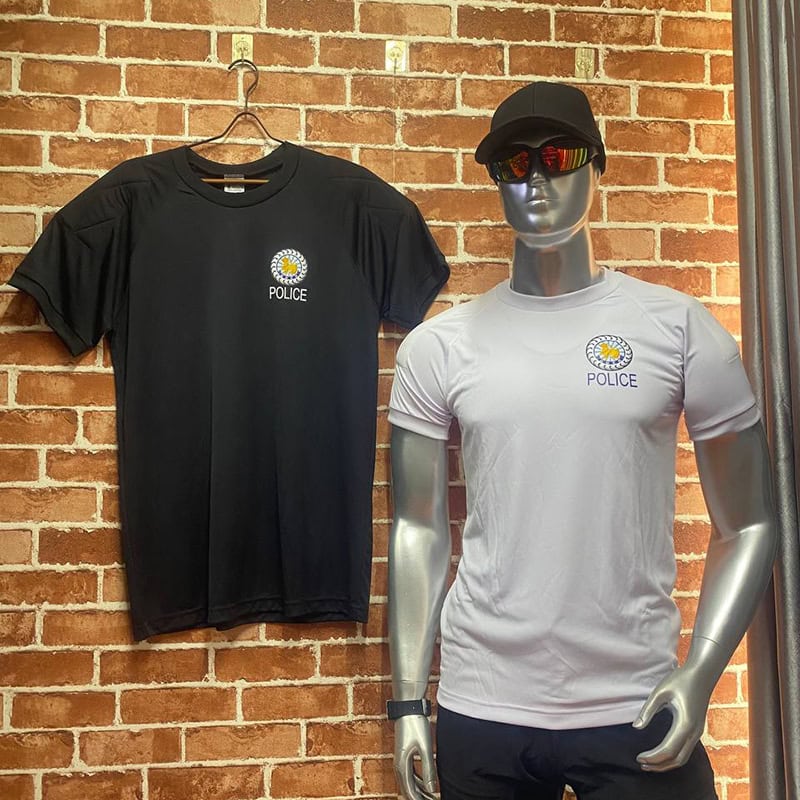 TSS27 Tactical T-Shirt with police graphic in black and white displayed on mannequin and hanger.