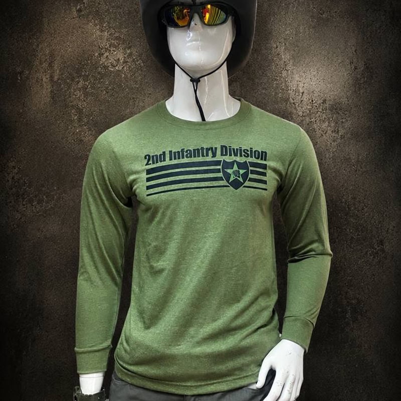Military-inspired long sleeve tactical shirt with printed chest and back graphics in green color.