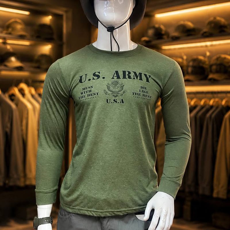U.S. Army graphic long-sleeve tactical shirt in green on mannequin in store.