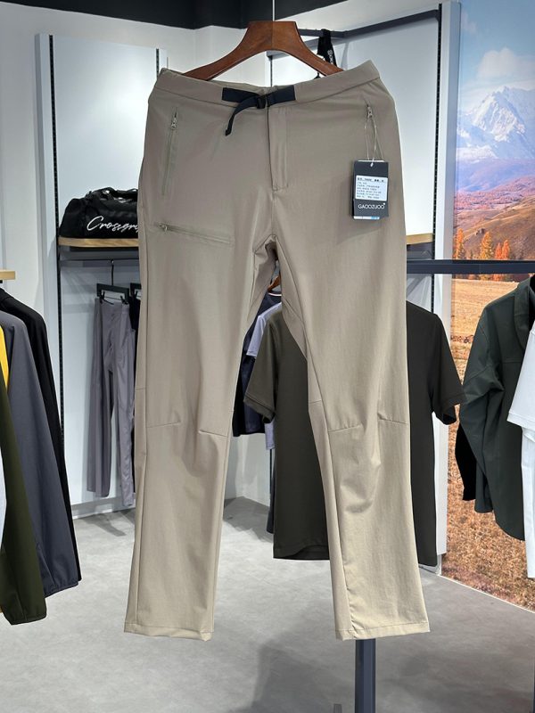 Long sleeve tactical outdoor shirt in beige with front pockets and quick-drying fabric for outdoor activities.