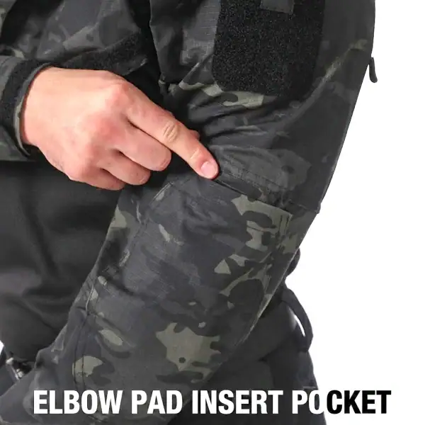 Tactical camouflage long sleeve combat shirt with elbow pad insert pocket for outdoor and tactical use.