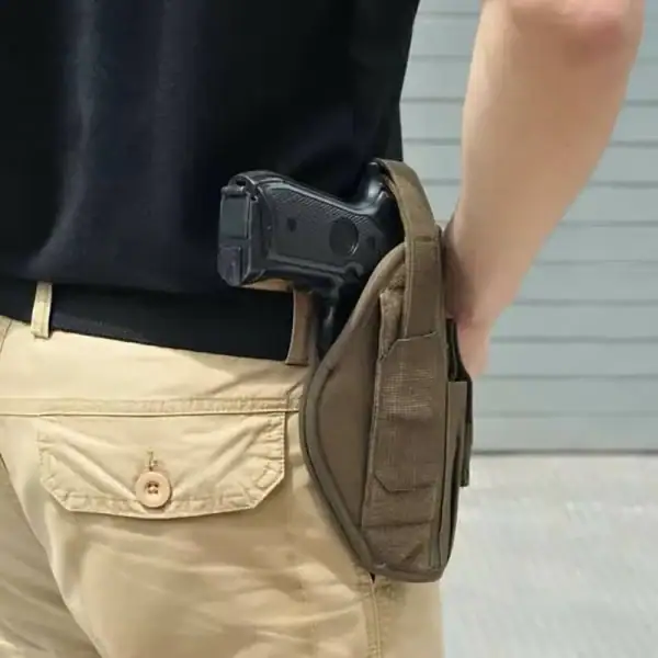 TTH24 Tactical Belt Holster with adjustable retention strap for tactical and outdoor use.