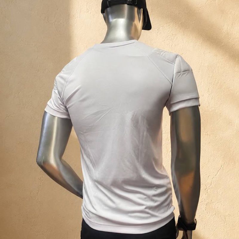 White athletic T-shirt with short sleeves and raglan seams on a mannequin.