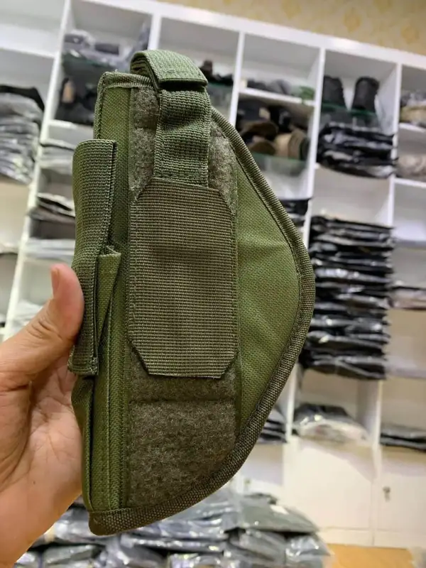 TTH24 Tactical Belt Holster in green with adjustable retention strap for outdoor and tactical use.