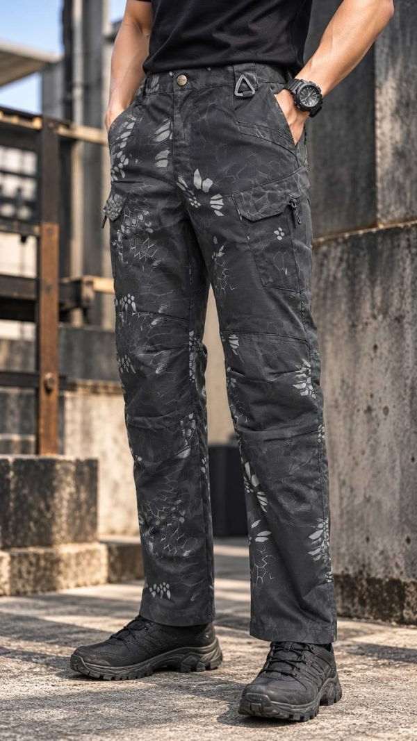 Dark camouflage tactical cargo pants for outdoor use, designed for durability and comfort.