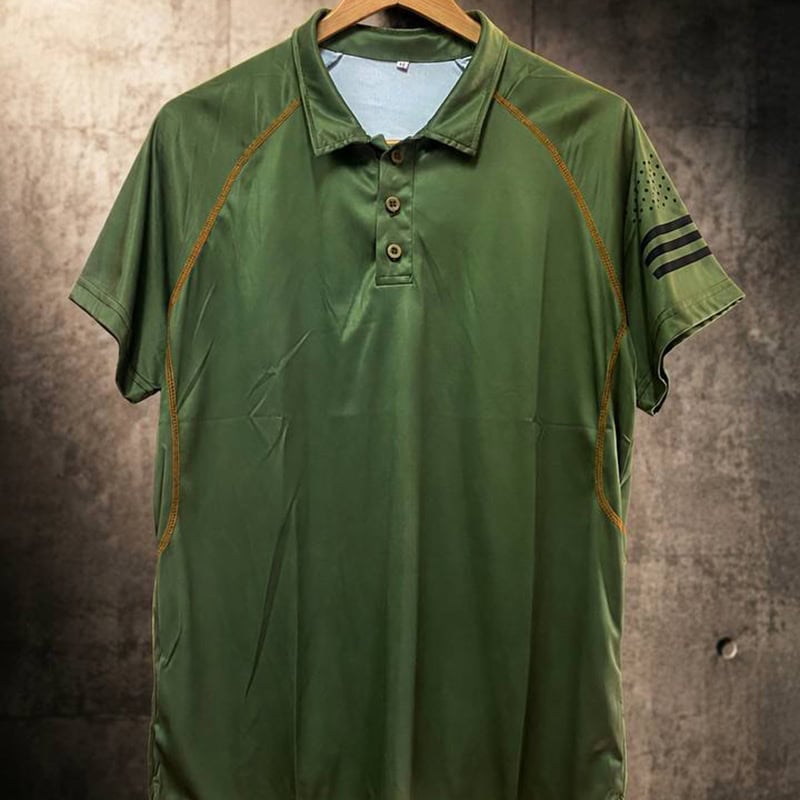 TSS45 Tactical Polo Shirt in green with contrast stitching and flag-style sleeve graphic.