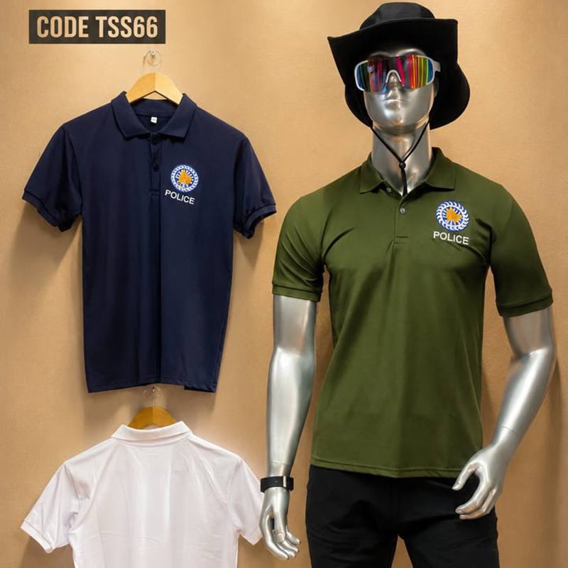 Police-style short sleeve polo shirt with embroidered police logo in navy and green colors.