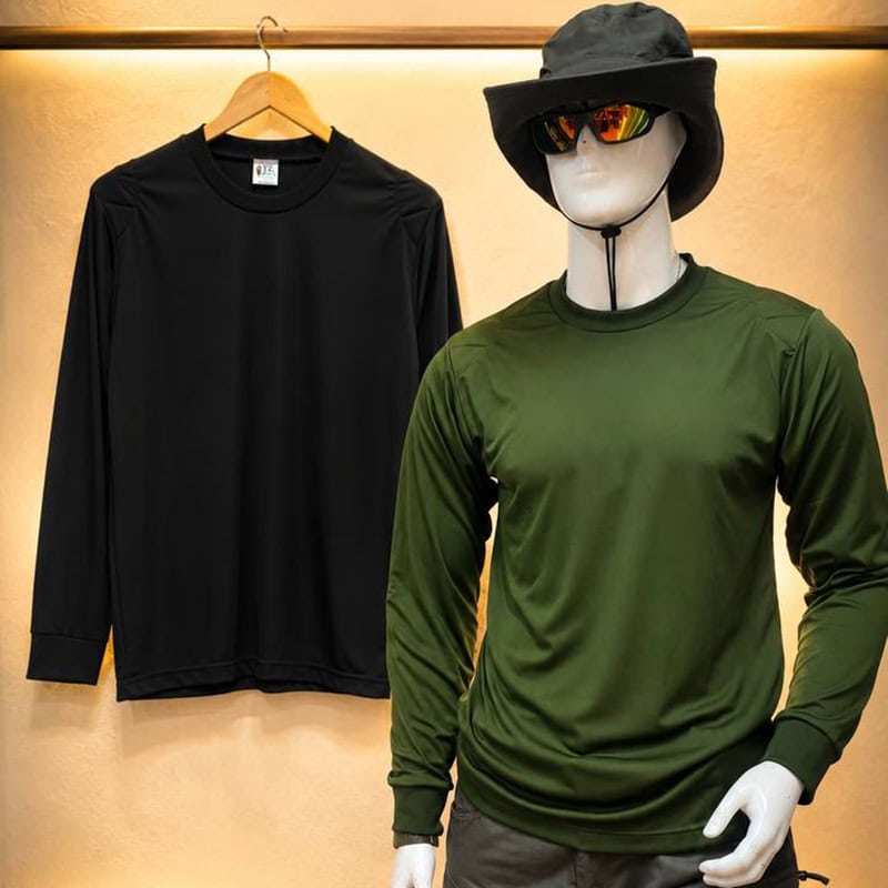 Unisex tactical outdoor shirt with quilted elbow pads in green, displayed on a mannequin with hat and sunglasses.
