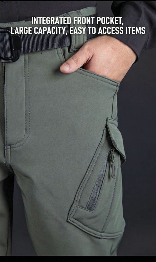 Tactical long sleeve shirt in olive green with dual chest pockets and wrinkle-resistant fabric.
