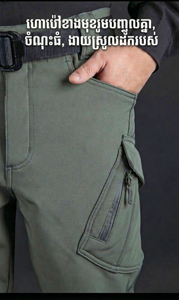 Tactical long sleeve shirt in blue with dual chest pockets, wrinkle-resistant fabric, and button-up front.