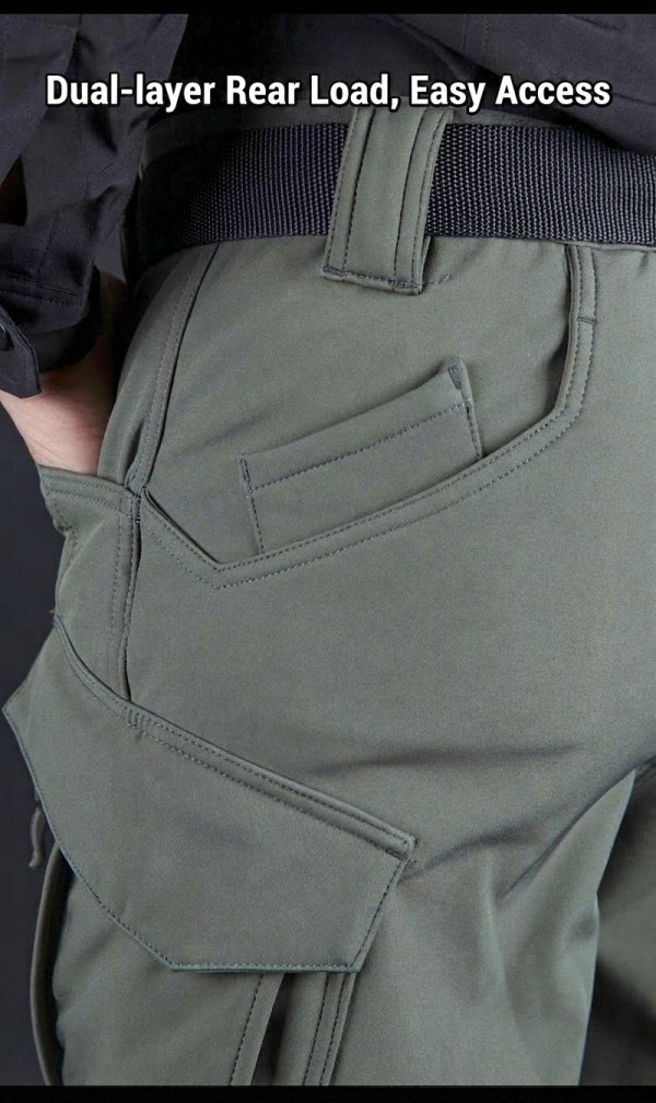 Tactical long sleeve shirt in olive green with dual chest pockets and wrinkle-resistant fabric.